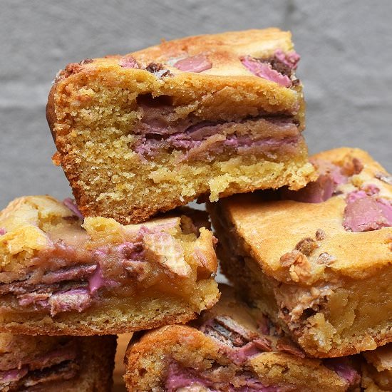 Ruby KitKat Blondies - Recipe photo by lightscamerabake