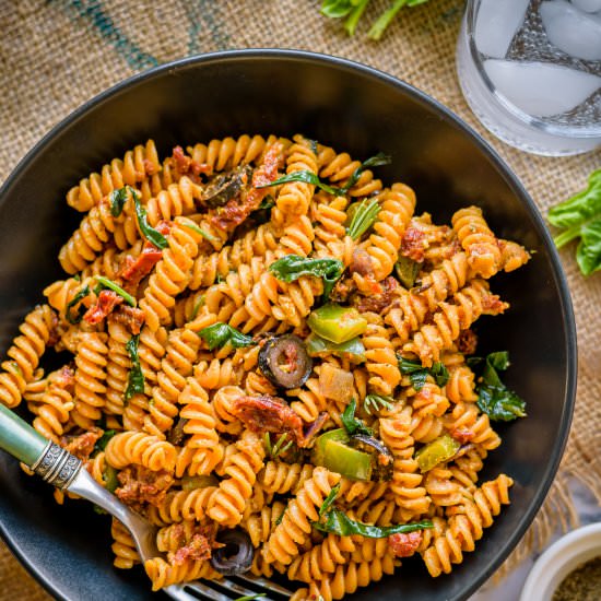 Lentil Pasta with Tomato Pesto - Recipe photo by Herbivore Cucina