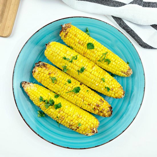 AIR FRYER CORN ON THE COB - Recipe photo by Stylish Cravings