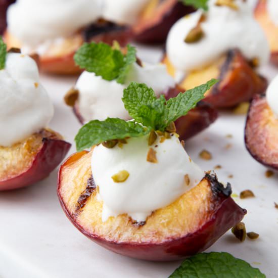 Grilled Peaches with Whipped Cream - Recipe photo by giftofhospitality