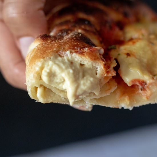 Vegan stuffed crust pizza - Recipe photo by 86Eats