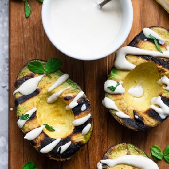 Grilled Avocados with Feta Tahini - Recipe photo by foodfaithfitness