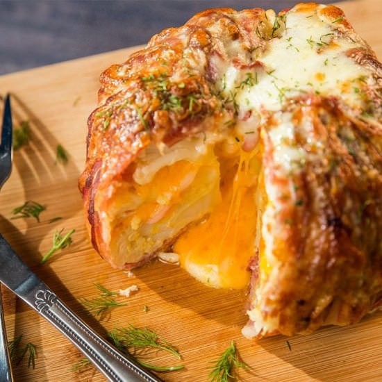 Bacon Wrapped Cheddar Stuffed Cauli - Recipe photo by Magos