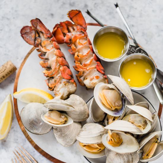 grilled lobster tails and clams - Recipe photo by wellseasonedstudio