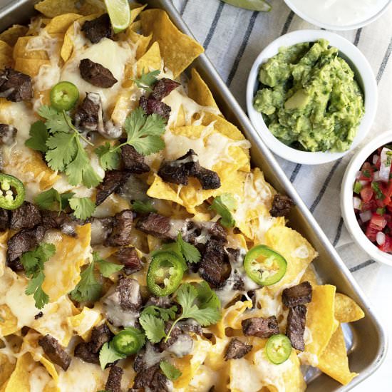 Carne Asada Nachos - Recipe photo by PinchandSwirl