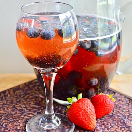 Sparkling Berry Rosé Sangria - Recipe photo by jeanieandluluskitchen