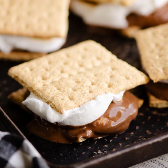 Peanut Butter Cup S'mores in Oven - Recipe photo by The Creative Bite