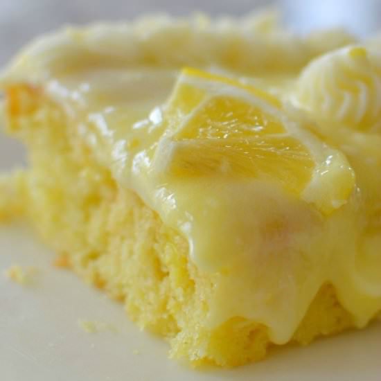 Lemon Pudding Poke Cake - Recipe photo by Small Town Woman