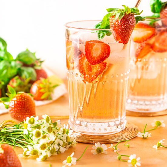 Strawberry-Basil Tom Collins - Recipe photo by Burrata and Bubbles