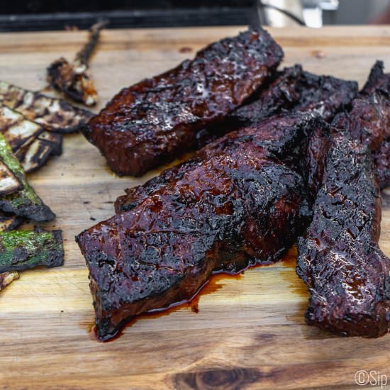 Spicy Honey Bourbon Steak Tips - Recipe photo by sipandspice