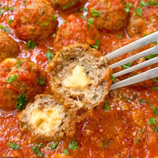Mozzarella Stuffed Meatballs - Recipe photo by FitSlowCookerQueen