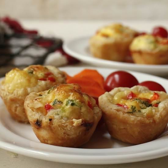 Savory Mini Swiss Cheese Quiches - Recipe photo by One Hot Oven