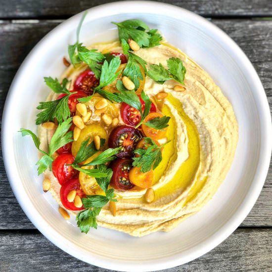 seasonal cherry tomato hummus bowl - Recipe photo by Jackie Newgent