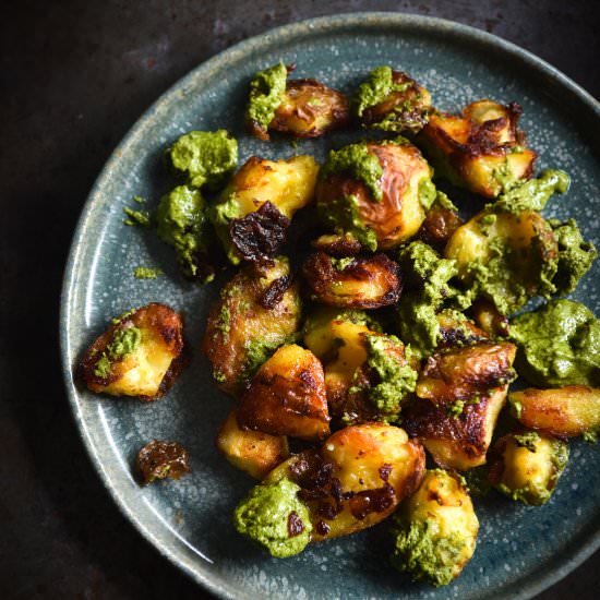 Crispy smashed potatoes with pesto - Recipe photo by georgeats