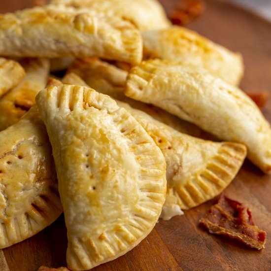 Sausage and Bacon Hand Pies - Recipe photo by glxrecipes