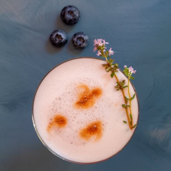 Blueberry pickle pisco sour cocktail - Recipe photo by peck of pickles
