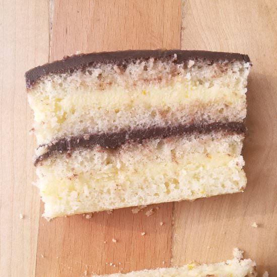 vanilla , orange and chocolate cake - Recipe photo by Flours n frostings