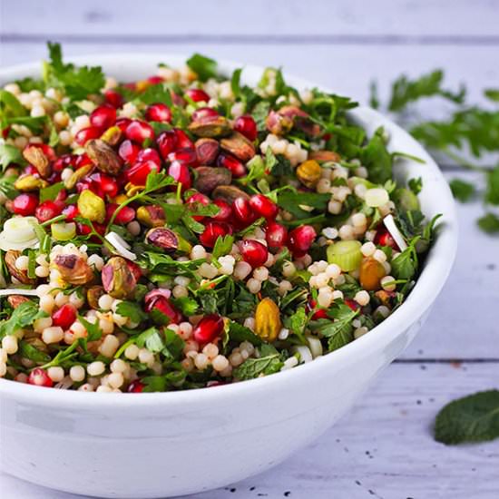 Festive Pomegranate Couscous Salad - Recipe photo by veganwithgusto