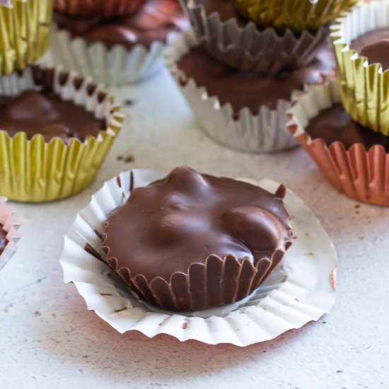 Dark Chocolate Peanut Clusters - Recipe photo by Girl Gone Gourmet