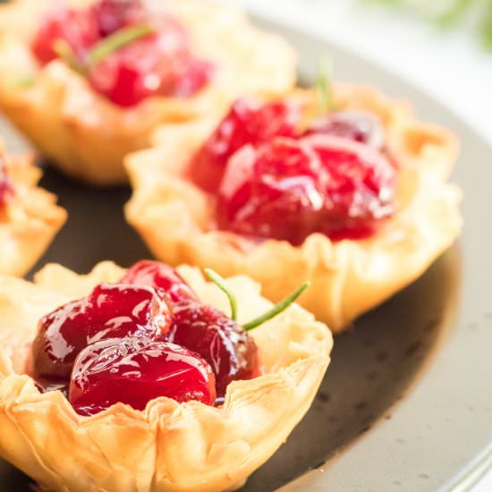Super Easy Cranberry Brie Bites - Recipe photo by mommymadethat