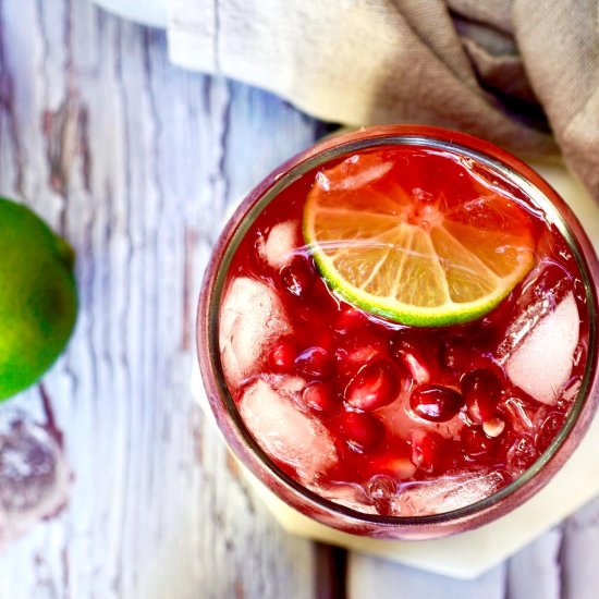 Pomegranate-Rum Punch - Recipe photo by simmerandsauce
