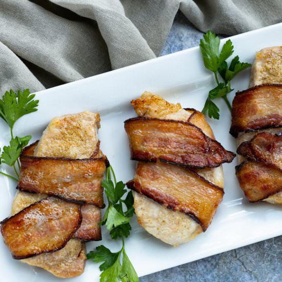 Bacon Wrapped Pork Chops - Recipe photo by littlebitrecipes