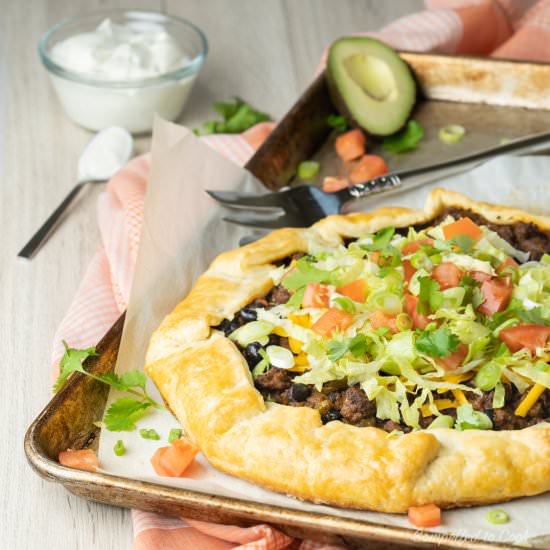 Beef Taco Crostada - Recipe photo by Compelled To Cook