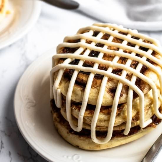 Vegan Cinnamon Roll Pancakes - Recipe photo by PlantPowerCouple