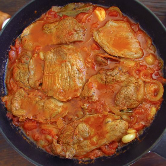 Steaks in tomato sauce - Recipe photo by Food From Portugal