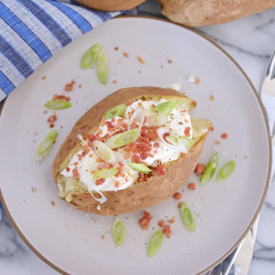 Easy Baked Potatoes in the Oven - Recipe photo by savoryexperiments