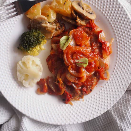 Roasted pork neck with tomatoes - Recipe photo by Dzi