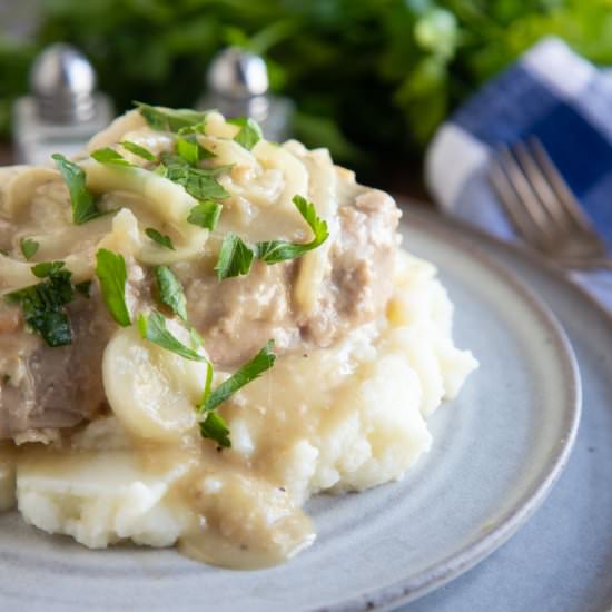 Smothered Pork Chops (Crockpot) - Recipe photo by KyleeCooks