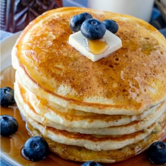 Blueberry Buttermilk Pancakes - Recipe photo by noshingwiththenolands
