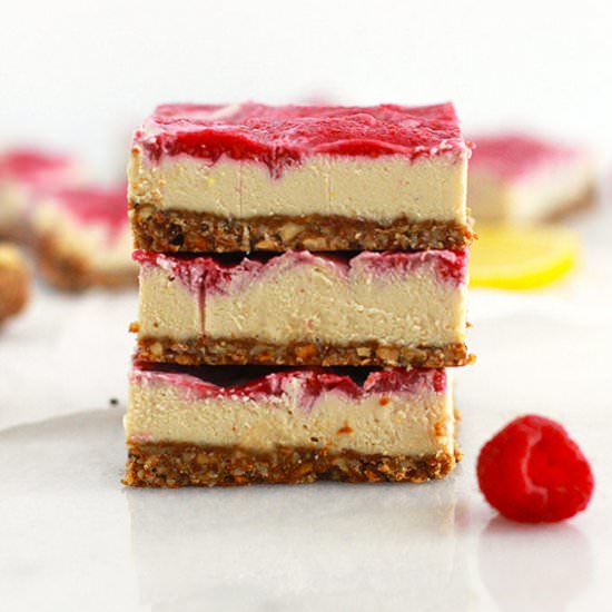 Raw Lemon Raspberry Cheesecake Bars - Recipe photo by FitLiving Eats