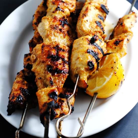 Moroccan chicken skewers - Recipe photo by white plate blank slate