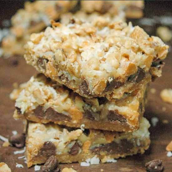 Sinful Seven Layer Magic Bars - Recipe photo by WhiskingUpYum