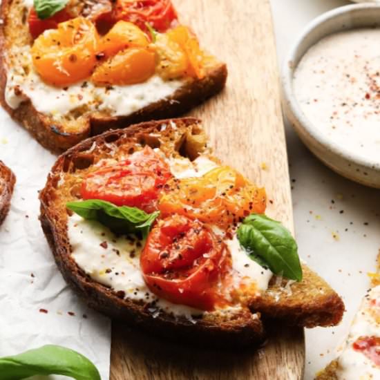 Roasted Caprese Toasts - Recipe photo by lindseyeatsla