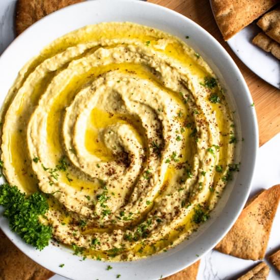 Extra Garlic Hummus - Recipe photo by PlantPowerCouple