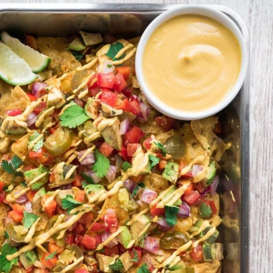The Best Loaded Vegan Nachos - Recipe photo by Sixhungryfeet
