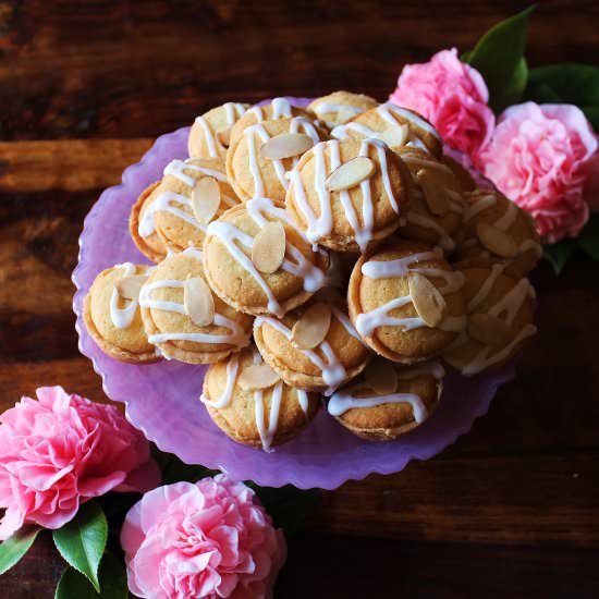 Raspberry Bakewell Mini Tarts - Recipe photo by TwoBitTart