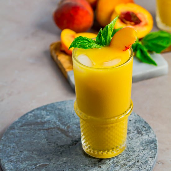 Tropical Peach Mango Rum Punch - Recipe photo by Spoonabilities