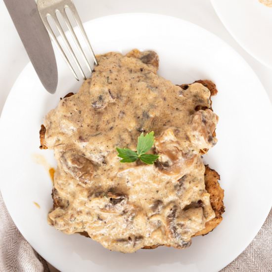 Instant Pot Smothered Pork Chops - Recipe photo by littlebitrecipes