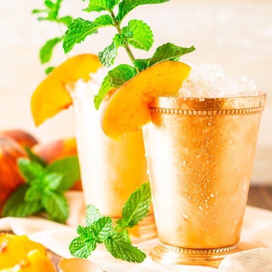 Brown Sugar-Peach Mint Julep - Recipe photo by Burrata and Bubbles