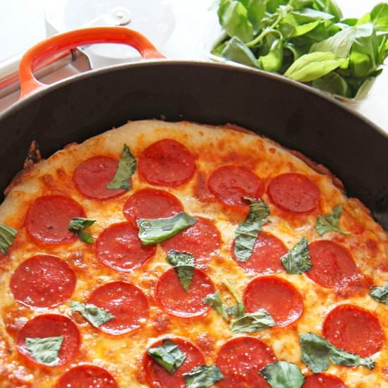 How to Make Pizza in a Cast Iron Pan - Recipe photo by Chop Happy