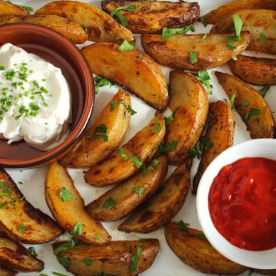 Cajun-Spiced Baked Potato Wedges - Recipe photo by The Pesky Vegan