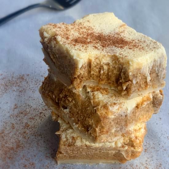 Crockpot Pumpkin Cheesecake Bars - Recipe photo by The Lazy Slow Cooker