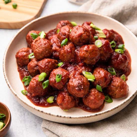 Crockpot Cranberry Sauce Meatballs - Recipe photo by thetravelpalate