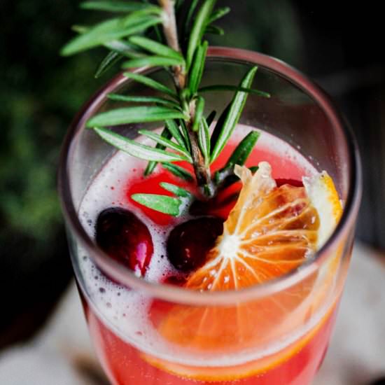Cranberry Orange Mimosa w/ Rosemary - Recipe photo by taoofspice