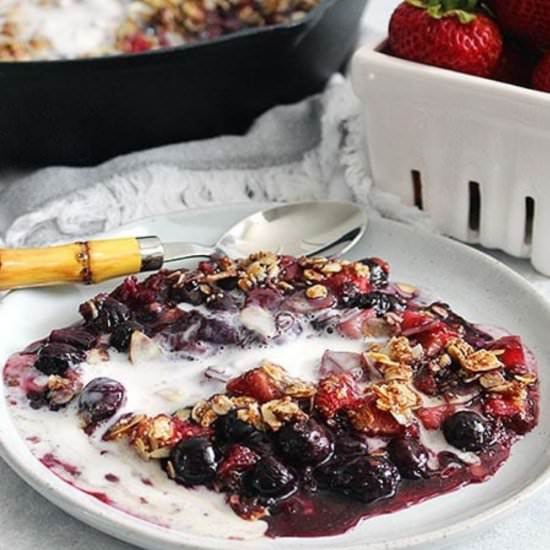 Almond Berry Crisp w/ Whipped Cream - Recipe photo by FitLiving Eats