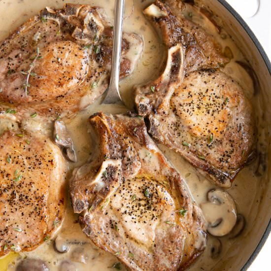 Creamy Smothered Pork Chops - Recipe photo by theforkedspoon